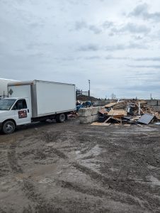 Get R Gone junk removal truck unloading at Green Valley Recycling In London Ontario