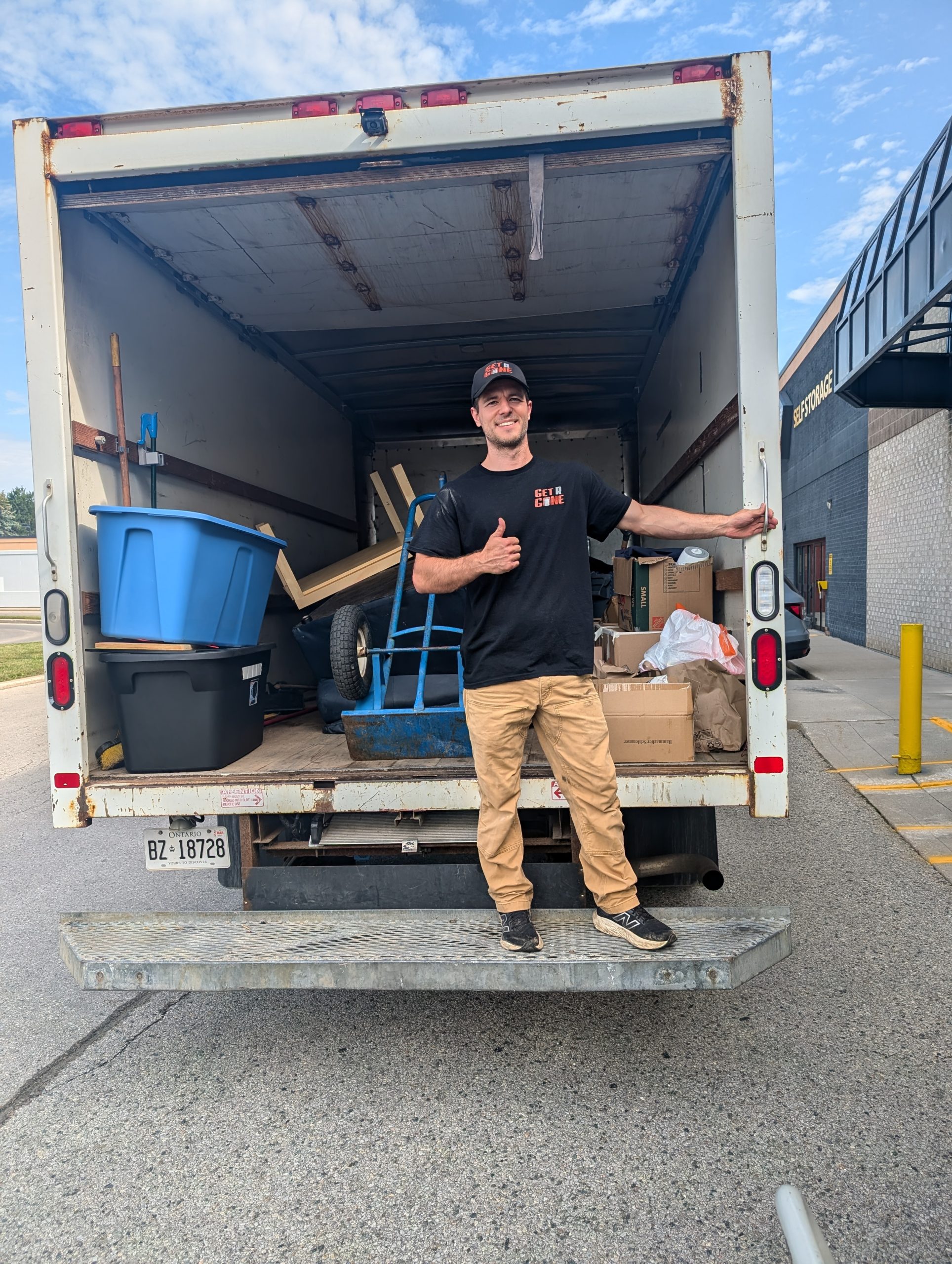 Mike Metcalfe in the back of his Junk Removal truck in London Ontario